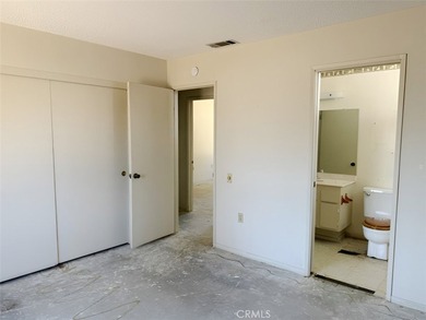 This 2-bedroom, 2-bathroom property offers genuine potential in - photo 6