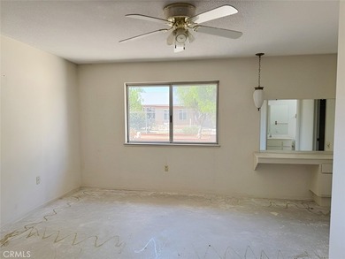 This 2-bedroom, 2-bathroom property offers genuine potential in - photo 8