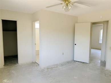 This 2-bedroom, 2-bathroom property offers genuine potential in - photo 9