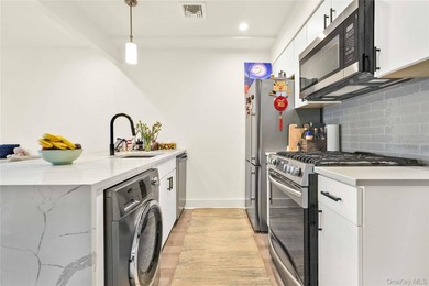 **Elevator Building** **Balcony** **In-unit Washer/Dryer Combo** - photo 14