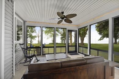 Lake life awaits! Enjoy 120' of prime Lake Winnebago frontage - photo 4