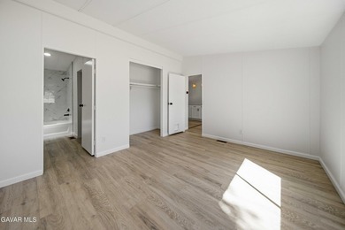 Beautifully remodeled 4 bedroom, 2 bathroom mobile home located - photo 11