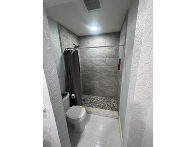 Welcome to this charming two-bedroom, one-and-a-half-bath - photo 12