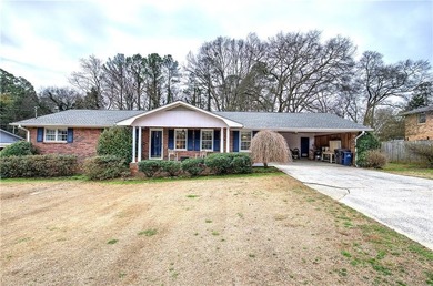 Charming 4-Sided Brick Ranch in the City with Original Hardwood