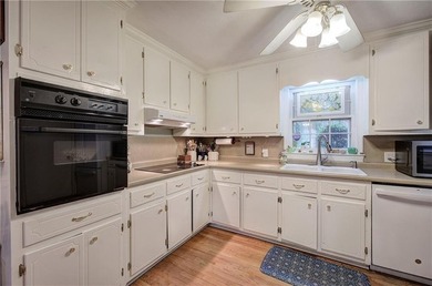 Charming 4-Sided Brick Ranch in the City with Original Hardwood