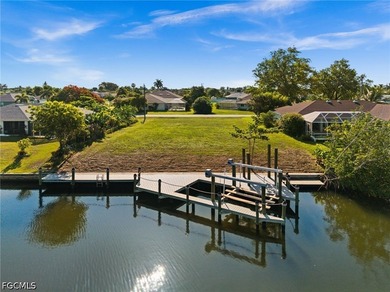 GULF ACCESS LOT WITH A NEWER SEAWALL, DOCK, CAPTAIN'S WALK, AND - photo 1