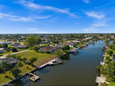GULF ACCESS LOT WITH A NEWER SEAWALL, DOCK, CAPTAIN'S WALK, AND - photo 2