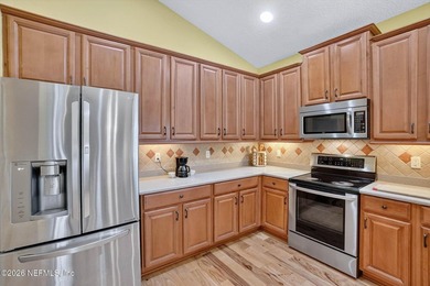 Tucked in an Arnold Palmer golf course community - where the - photo 13