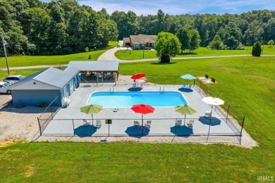 WELCOME TO LAKE HELMERICH VILLAGE!!! Own this property and - photo 22