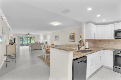 Lake Condo For Sale in Atlantis, Florida