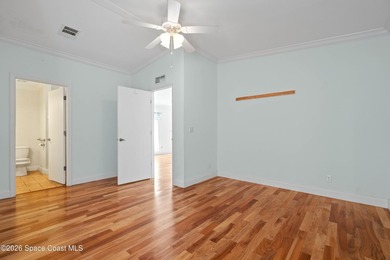 Spacious four-bedroom, three-bath home featuring a versatile - photo 14