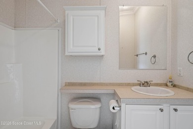 Spacious four-bedroom, three-bath home featuring a versatile - photo 18