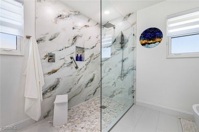 Experience true coastal luxury in this beautifully remodeled - photo 32