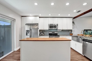 An updated and spacious corner villa in Forest Lake community at - photo 11