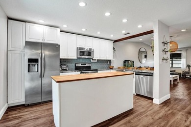 An updated and spacious corner villa in Forest Lake community at - photo 12