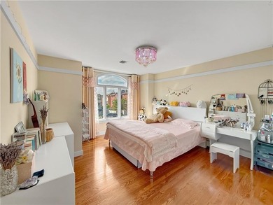 Built in 2013, this detached two-family home with brick front - photo 14
