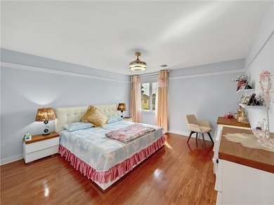 Built in 2013, this detached two-family home with brick front - photo 15