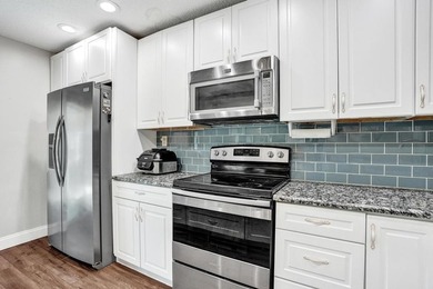 An updated and spacious corner villa in Forest Lake community at - photo 15