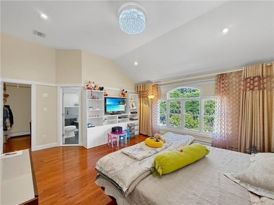 Built in 2013, this detached two-family home with brick front - photo 17