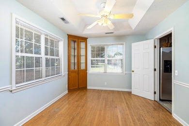 This charming home is on the 11th fairway of Lakewood Links. It - photo 11