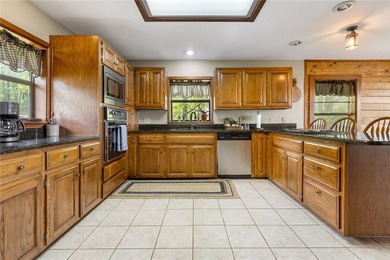 Escape to the beauty of the Ozarks with this stunning 5-bedroom - photo 13