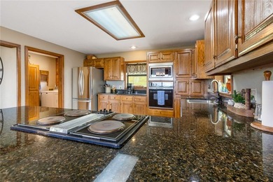 Escape to the beauty of the Ozarks with this stunning 5-bedroom - photo 15