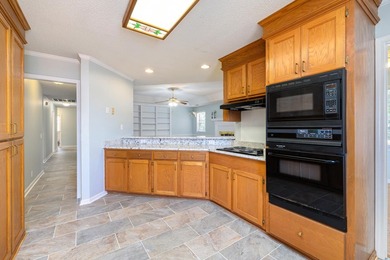 This charming home is on the 11th fairway of Lakewood Links. It - photo 21