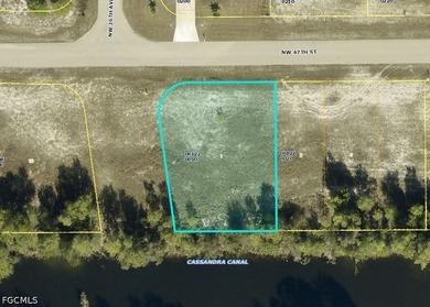 Build your dream home on this vacant freshwater canal lot in NW - photo 2