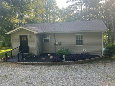 Welcome to this cute 2 bedroom bungalow nestled in the Blue - photo 16