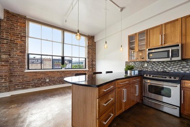 Welcome to this beautiful, updated condo located in the historic