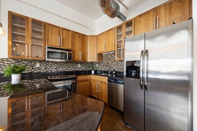 Welcome to this beautiful, updated condo located in the historic