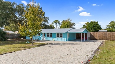 Welcome to 317 Canal Street, a 3BR/1.5BA beach cottage just a - photo 3