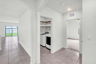 Discover WATERFRONT living in Cypress Bay Preserve! BUILT IN - photo 14