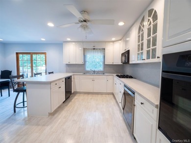 Welcome to this beautifully maintained and expanded split-level - photo 6