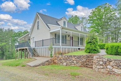 Nestled on 13.8 private acres with water frontage on beautiful - photo 2