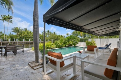 Perfectly positioned in prestigious Las Olas Isles, this - photo 6