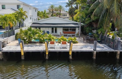 Perfectly positioned in prestigious Las Olas Isles, this - photo 7