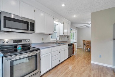 Nestled on 13.8 private acres with water frontage on beautiful - photo 7