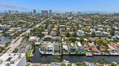 Perfectly positioned in prestigious Las Olas Isles, this - photo 8