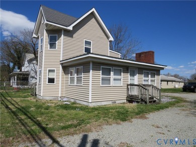This 2-story, 3-4-bedroom 3 full bath house is a wonderful Handy - photo 2