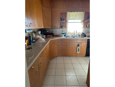 Handicap accessible two bedroom brick ranch! Newer walk-in