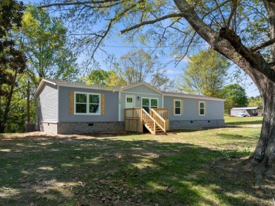 Enjoy the best of lake living without the lakefront price! - photo 1