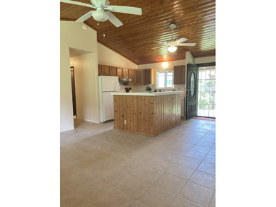 Paradise found in Hawaii!! Beautifully maintained home located - photo 3