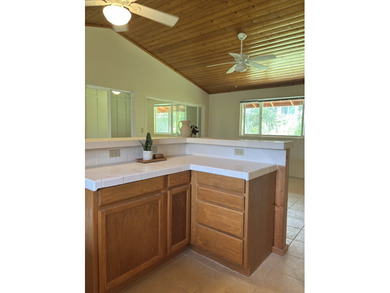 Paradise found in Hawaii!! Beautifully maintained home located - photo 7