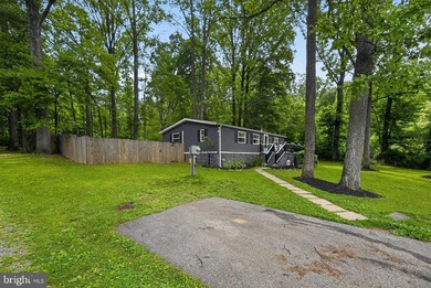 Welcome to 127 Spring Hill Lane! Nestled on approximately one - photo 2