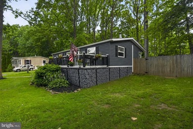 Welcome to 127 Spring Hill Lane! Nestled on approximately one - photo 3