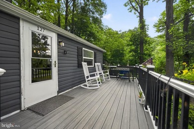 Welcome to 127 Spring Hill Lane! Nestled on approximately one - photo 4