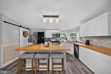 Welcome to 127 Spring Hill Lane! Nestled on approximately one - photo 6