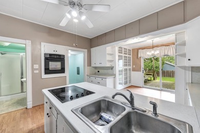 This charming 4-bedroom, 1-bath home is located in a quiet - photo 10