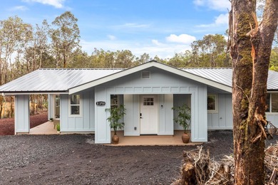 Tucked away on a quiet dead-end road in Mauna Loa Estates, this - photo 2